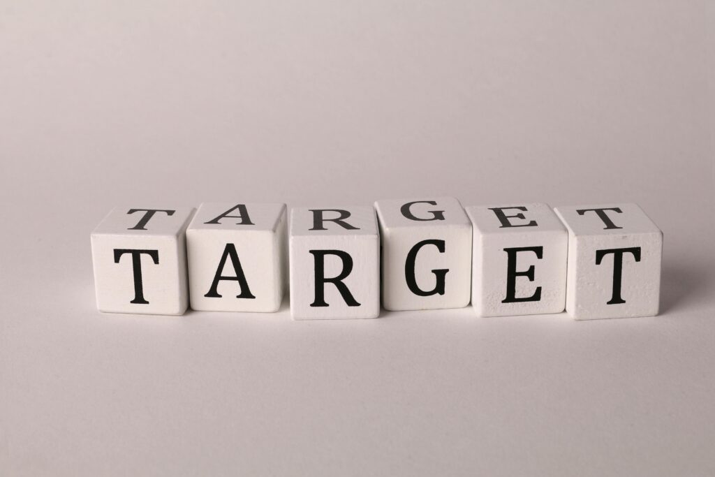 White cubes spelling 'TARGET' on a neutral background, ideal for business or marketing concepts.